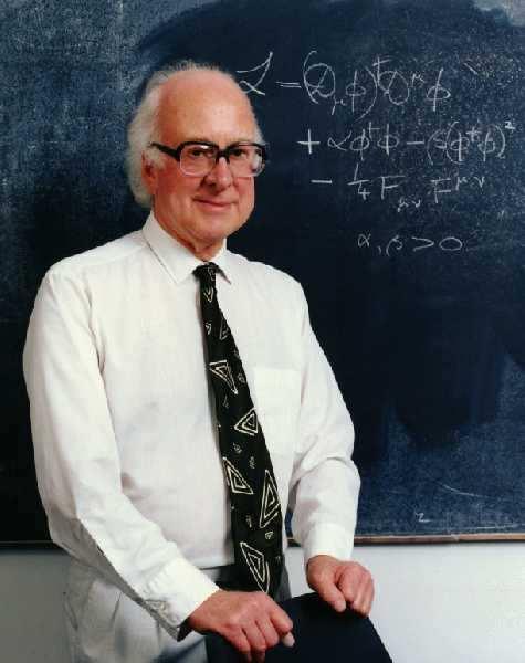 Peter W. Higgs Na możliwość nadania mas nośnikom oddziaływań poprzez spontaniczne łamanie symetrii wskazał czterdzieści lat temu (1964) Peter W. Higgs. Mechanizm spontanicznego łamania symetrii, zwany także mechanizmem Higgsa, jest podstawa współczesnej teorii oddziaływań elektrosłabych.