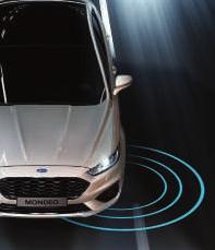 FORD MONDEO Innowacyjne technologie System wspomagający utrzymanie pojazdu na pasie ruchu Dostępny przy prędkościach powyżej 65 km/h na drogach z wyraźnym oznakowaniem poziomym.