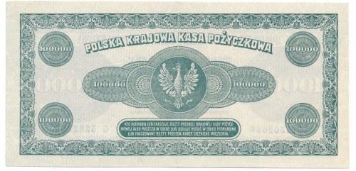 100 000 marek 1923 -G- Złamany centralnie z kreską pod światło.