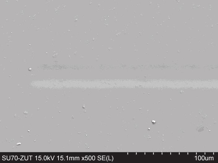 Picture of the beginning of the scratch after scratch tests on the coatings with different carbon content: a) 2.6 wt %, b) 5.