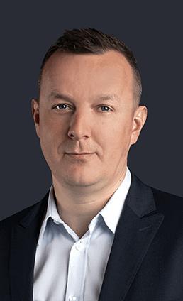 Współzałożyciel Comarch (1994), gdzie piastował stanowiska Pierwszego Wiceprezesa oraz Prezesa Zarządu (1993-2000), odpowiedzialny za rozwój sektora telekomunikacyjnego, ekspansję międzynarodową oraz