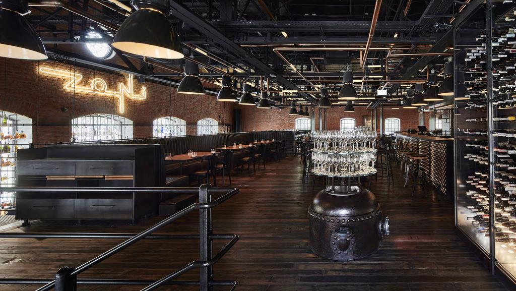 Wnętrze Do aranżacji wnętrz restauracji ZONI znajdującej się w historycznym budynku rektyfikacji