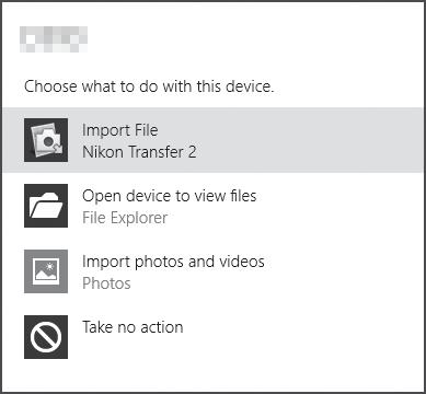 1 W menu Import pictures and videos (Importuj zdjęcia i filmy) kliknij opcję Change program (Zmień program). Zostanie wyświetlone okno dialogowe wyboru programu.