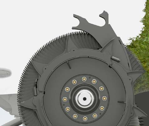 Opuszczony o 500 mm przenośnik w podłodze przekazuje zebrany i pocięty materiał bezpośrednio do skrzyni ładunkowej. Wyeliminowano stromy i wąski kanał nad rotorem.