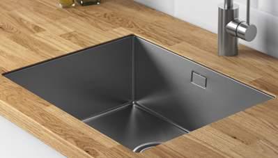 czyści. Ponadto ociepla kuchnię. Użyte produkty HACKBOL zlew 2 komory, 34 44 cm/34 40 cm, biały akryl. 003.