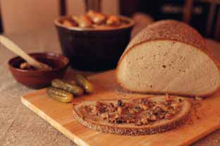 lentil, as well as chunks of fragrant bread with homemade lard and gherkin.