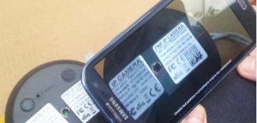 24: Przybliż telefon dowodu QR ze spodu kamery.