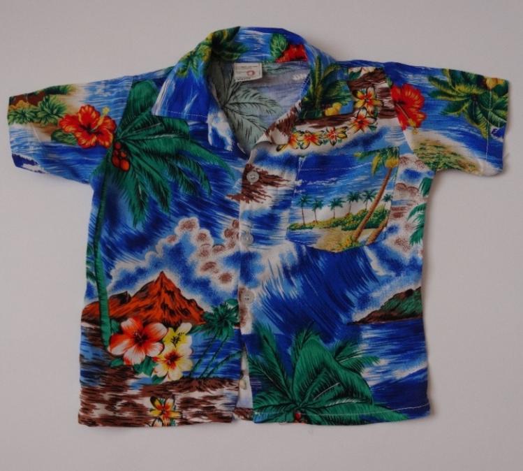 5. Pālule aloha - koszula hawajska Projektant/Firma: hawajska sztuka ludowa Koszula hawajska, zwana koszulą aloha (ang. aloha shirt, haw.