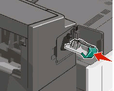 6 Wciśnij mocno pojemnik na kasetę zszywek z powrotem do modułu zszywacza tak, aby