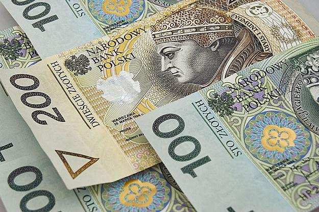 nieruchomości będzie nakładał w drodze decyzji wójt,