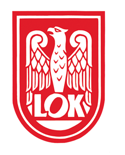 Pod słońcem co w biegach rumieni nam twarz, W kabinie pojazdu z modelem w powietrzu, A w krótkofalówce świat cały jest nasz.