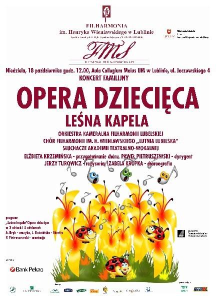 Spotkaliśmy się z górnikiem. Strój górnika składa się z czarnej marynarki, spodni i czapki z pióropuszem. Marynarka ma złote guziki, na rękawach zakładki.