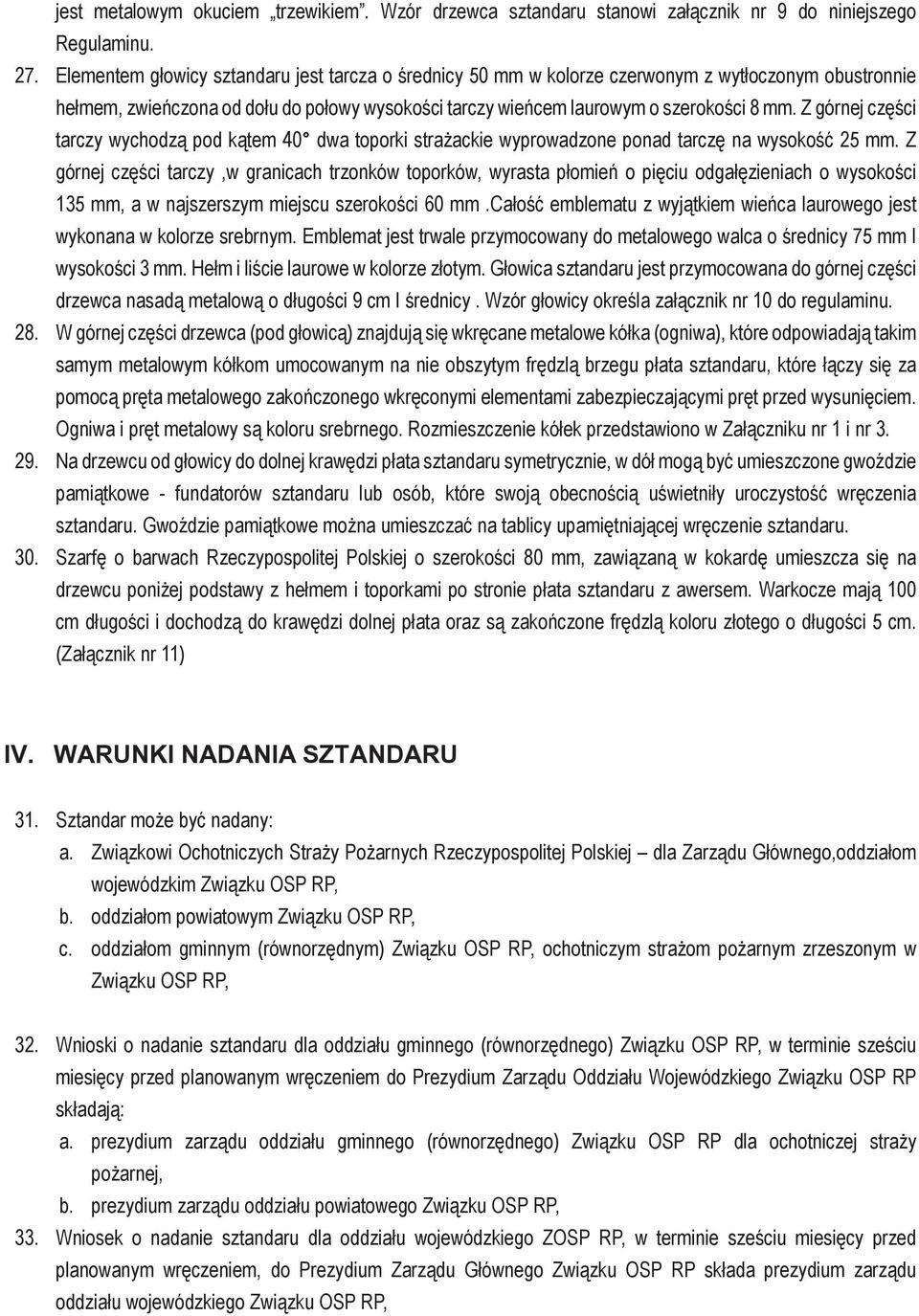 Z górnej części tarczy wychodzą pod kątem 40 dwa toporki strażackie wyprowadzone ponad tarczę na wysokość 25 mm.