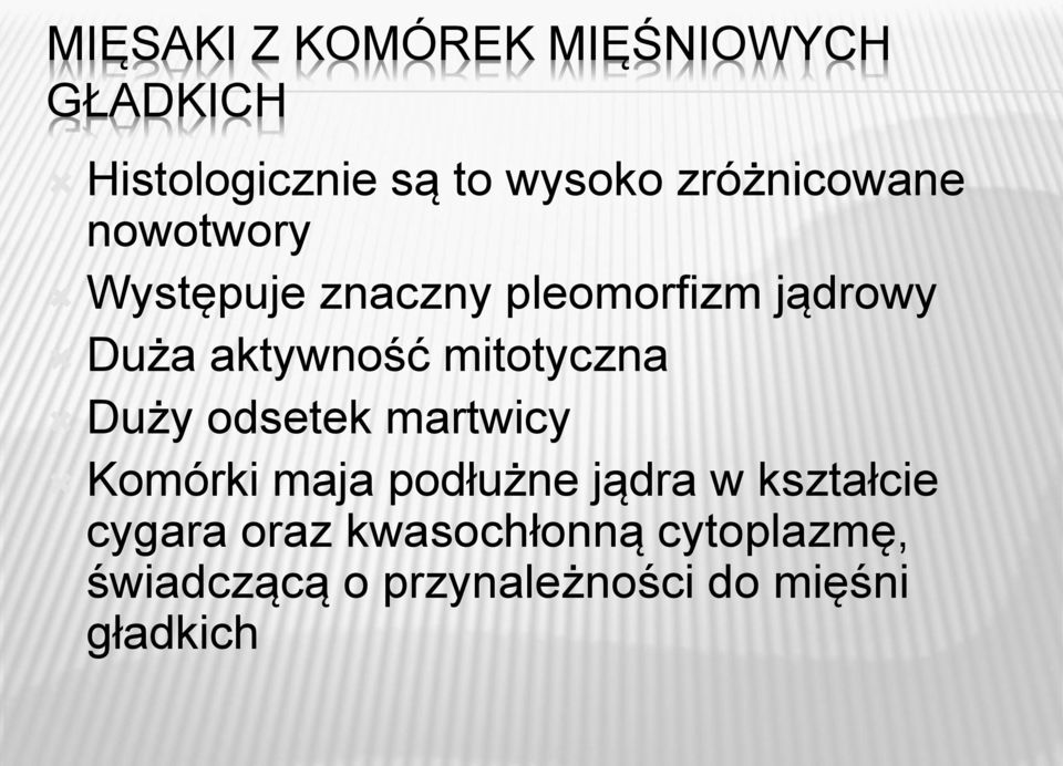 aktywność mitotyczna Duży odsetek martwicy Komórki maja podłużne jądra w