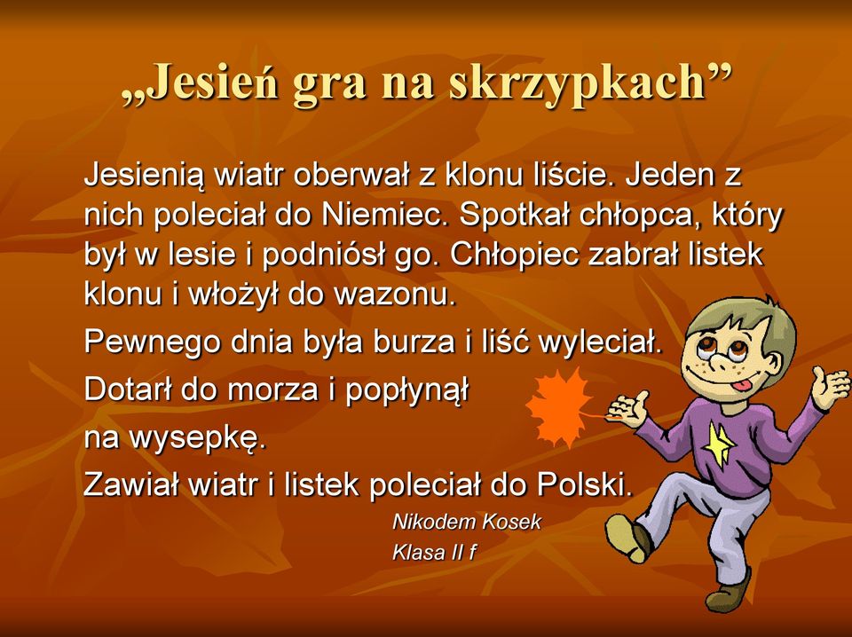 Chłopiec zabrał listek klonu i włożył do wazonu.