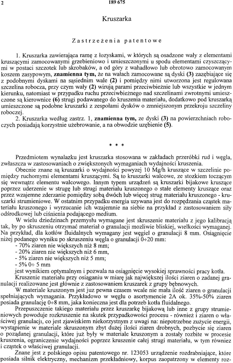 a od góry z wahadłowo lub obrotowo zamocowanym koszem zasypowym, znamienna tym, że na wałach zamocowane są dyski (3) zazębiające się z podobnymi dyskami na sąsiednim wale (2) i pomiędzy nimi