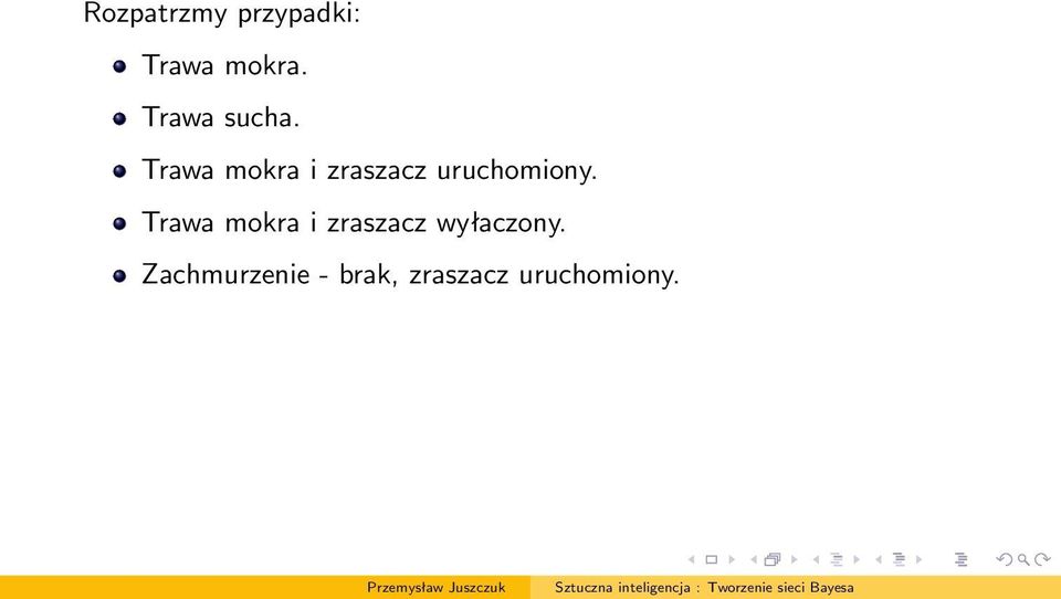 Trawa mokra i zraszacz uruchomiony.
