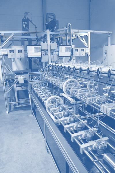 Produkcja Linia legalizacyjna Własna linia produkcyjna materiały najwyższej jakości precyzja mechaniczna w pełni zautomatyzowany proces