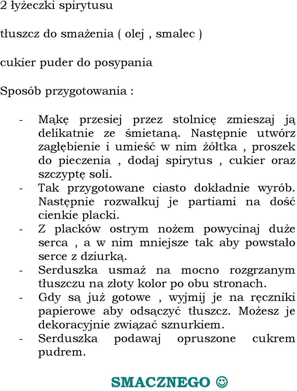 Następnie rozwałkuj je partiami na dość cienkie placki. - Z placków ostrym nożem powycinaj duże serca, a w nim mniejsze tak aby powstało serce z dziurką.