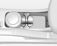 Schowki 61 Schowek poniżej przełącznika świateł Schowek w desce rozdzielczej podczas jazdy drzwiczki schowka w desce rozdzielczej powinny być zawsze zamknięte.