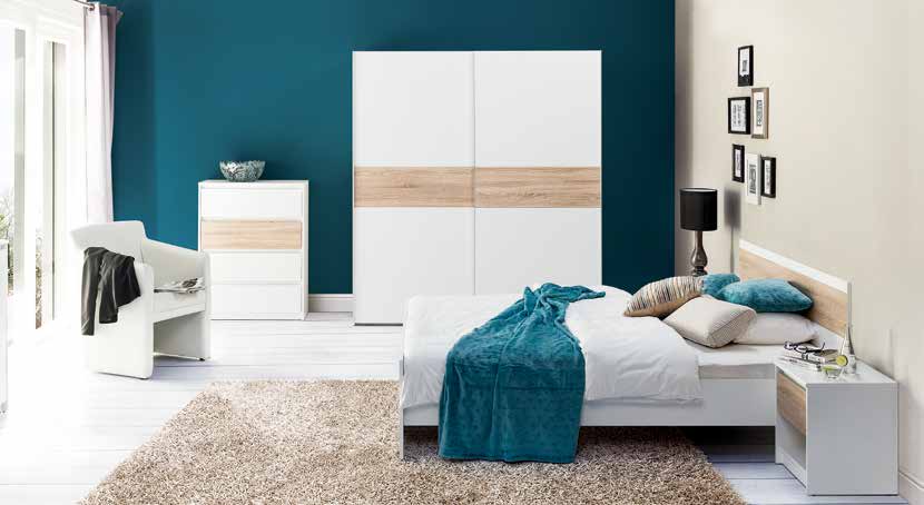 Wenecja Nowoczesna sypialnia, stworzona z minimalistycznych brył charakteryzujących się prostą formą. Elementem wyróżniającym mebel jest połączenie bieli z dębem sonoma.
