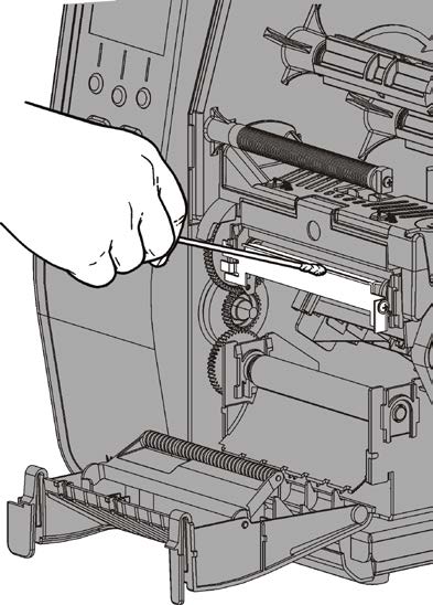 Czyszczenie Oczyścić głowicę drukującą, pręt do odklejania etykiet, czujniki i rolkę dociskającą, jeżeli na odcinku, przez który przechodzi materiał, nagromadziły się pozostałości kleju.