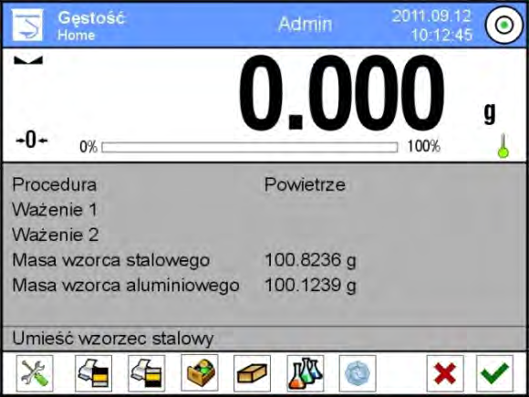 8. Położyć wzorzec stalowy, po ustabilizowaniu się wskazania zatwierdzić wynik, naciskając przycisk < >. 9.