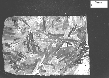 Rys. 1. Stop Ni 3 Al przed modyfikacją (granice ziaren, zaznaczono graficznie) Fig. 1. Ni 3 Al alloy before modification (note marked grain boundaries) Rys. 2.