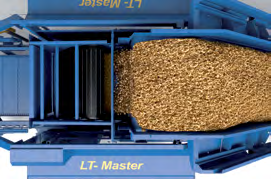 Z przenośnika taśmowego materiał trafia do komory prasującej GÖWEIL / LT-Master / Strona 12-13 Odpowiednio dozowany