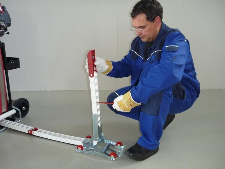 7.4 Wymiana mechanizmu prowadzącego Krok 1.