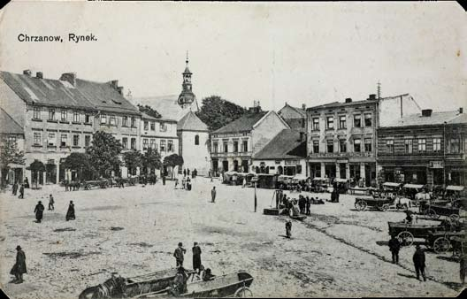 19 Rynek pierzeja zachodnia i północna - widok na kościół św. Mikołaja. Nakł. T.K.Ch.