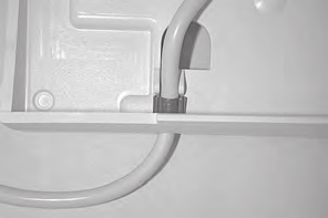 6 Włożyć kabel (3) do górnej części obudowy terminala.