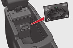 Ergonomia i komfort Gniazdo 230 V / 50 Hz Gniazdo 230 V / 50 Hz (moc maks.: 120 W) jest zainstalowane w środkowej konsoli.