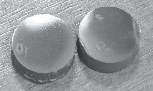 Polished, inhomogeneous surface of SPS sintered B 4 C bodies containing TiC, TiN or TiB 2 additive.