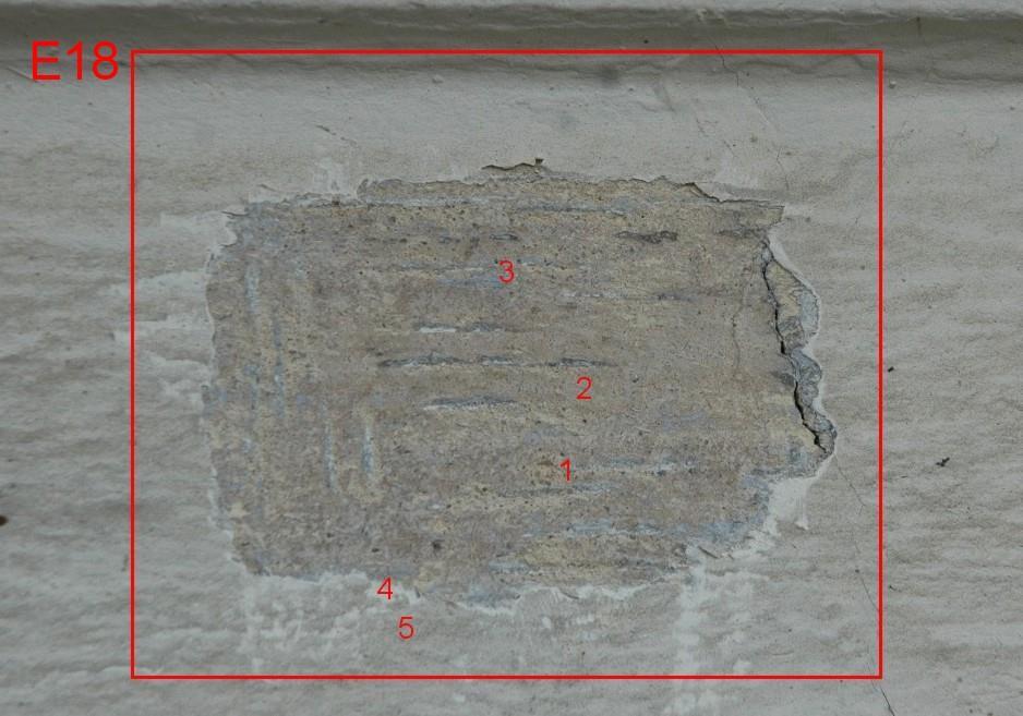 Odkrywka E18. Widoczne beżowe wymalowanie ściany wg NCS-u S 1510-Y10R.