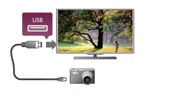 W"$cz aparat po ustanowieniu po"$czenia. Instalacja myszy W"$cz telewizor i pod"$cz mysz USB do jednego ze z"$czy USB z boku telewizora. Mo!esz tak!e pod"$czy# mysz USB do pod"$czonej klawiatury USB.