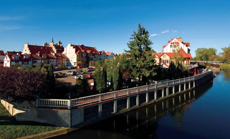 PIŠAS (PISZ) Kviečiame aplankyti Mozūrijos kraštą! PIŠAS jauki vietovė Mozūrijoje, išsidėsčiusi šalia Ros (Roś) ežero ir Pisos upės.