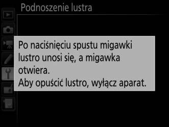 4 Naciśnij J. Na monitorze zostanie wyświetlony komunikat widoczny po prawej stronie, a na wyświetlaczu LCD i w wizjerze będzie widoczny rząd kresek.