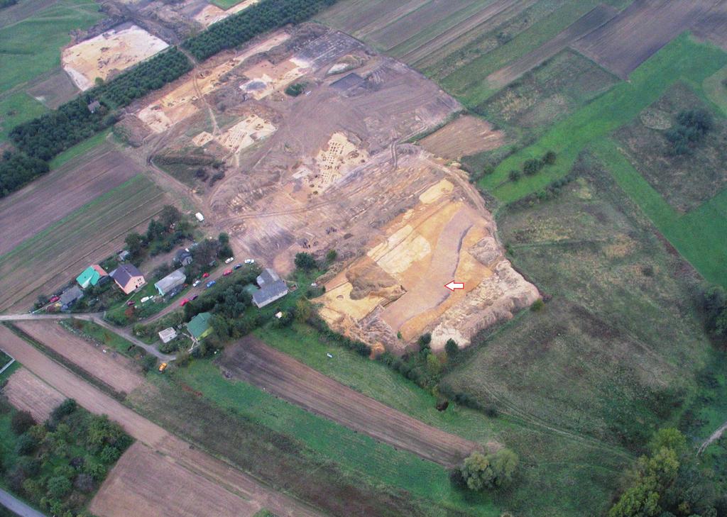Fig. 2. Brzezie, site 17, Wieliczka district. Aerial photo of the excavated area featuring a tectonic crack in the foreground.