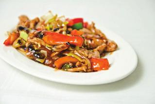 25,80 (papryka, por, ziarno czarnej fasoli) Loin of pork in garlic sauce