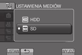 Korzystanie z karty microsd Opisywana kamera została fabrycznie ustawiona na rejestrowanie materiału wideo na wbudowanym dysku twardym. Istnieje możliwość zmiany nośnika zapisu na kartę microsd.