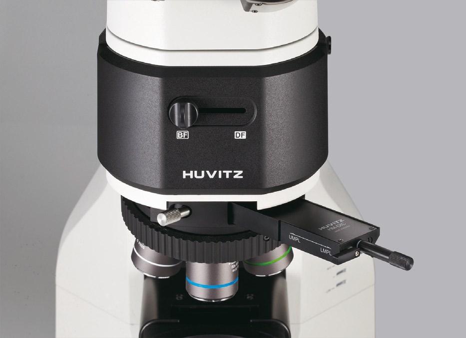 Filtry te zostały zaprojektowane w postaci wsuwki dostępnej z obu stron mikroskopu.