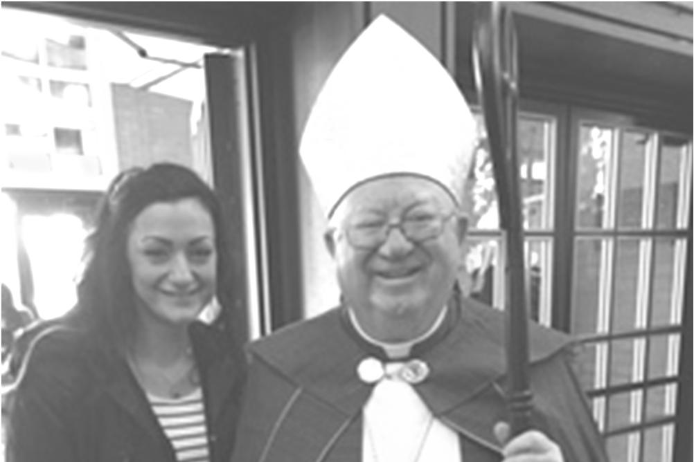 Our RCIA Candidates Marianna Garcia (left) and Amanda Brown (right) with Bishop Murphy at last Sunday s Right of Election Mass at St. Joseph s in Ronkonkoma.