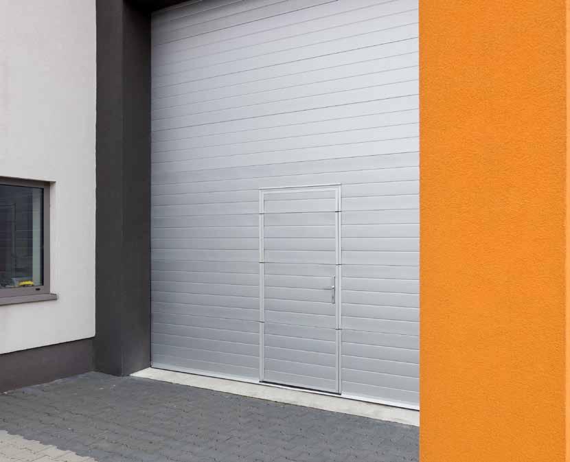 Furtka serwisowa FURTKA SERWISOWA WBUDOWANA W BRAMĘ GARAŻOWĄ Bramy garażowe wykonane z paneli o grubości 40 mm można wyposażyć w furtkę serwisową.