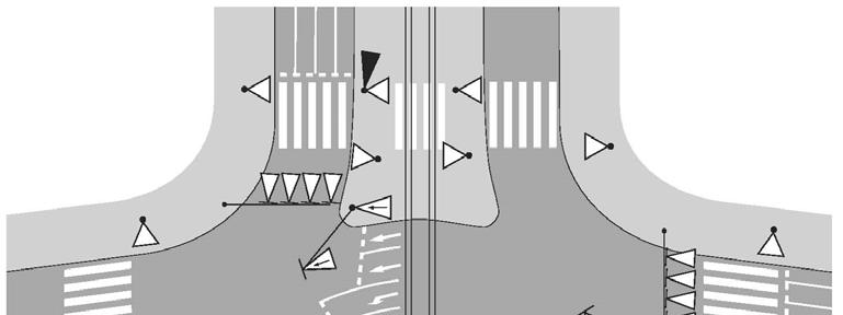 Funkcjonowanie skrzyżowań z wyspą centralną Rys.1. Przykład lokalizacji sygnalizatorów na skrzyżowaniu z ruchem okrężnym i torowiskiem tramwajowym [6] 2.
