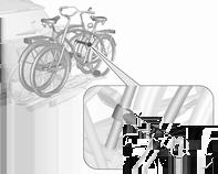 Schowki 73 5. Rowery mocować za pomocą uchwytów i pasków mocujących, w sposób opisany dla pierwszego roweru. Uchwyty mocujące należy montować równolegle.