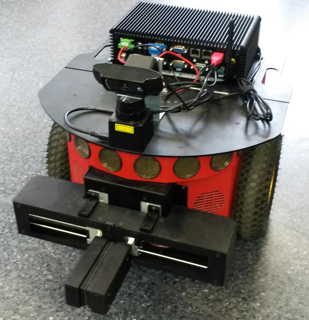 2 Weryfikacja własności ruchowych... Rysunek 1: Pioneer 3-DX 3 Zasady bezpieczeństwa Robot Pioneer 3DX jest robotem mobilnym dwukołowym (rys. 1).