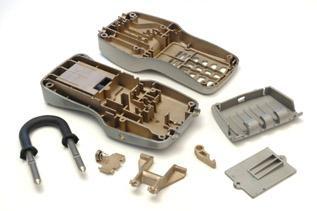 Rys. 13. 8 części złożeniowych kłódki wykonanych DirectMetal 20, czas dostawy 1 tydzień (80% redukcja czasu) (Firma EOS) Fig. 13. 8 parts of padlock manufactured uusing DirectMetal 20; time of delivery 1 week, (8o % time reduction Firma EOS) 5.