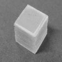 10x10 mm wytwarzano metodą prasowania na gorąco cienkich folii kompozytowych (rys. 1). Jako dodatki modyfikujące zastosowano długie włókna węglowe T300 (prod.