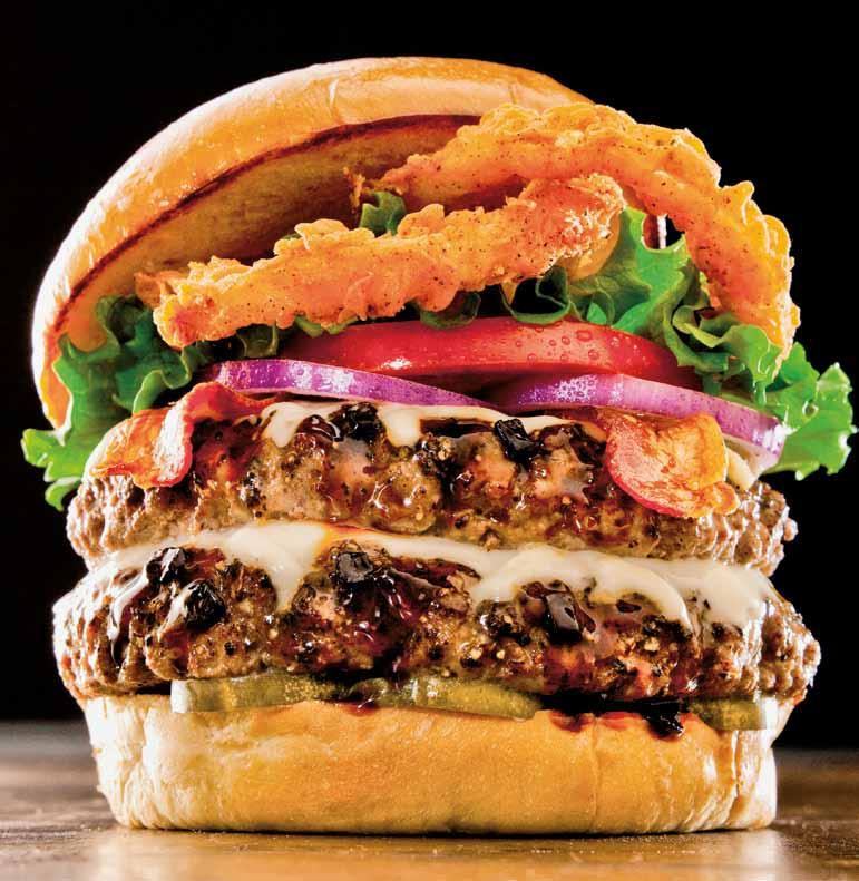 BURGERY SPECJALNE Wszystkie burgery specjalne serwujemy w tostowanej bułce maślanej Brioche oraz frytkami.